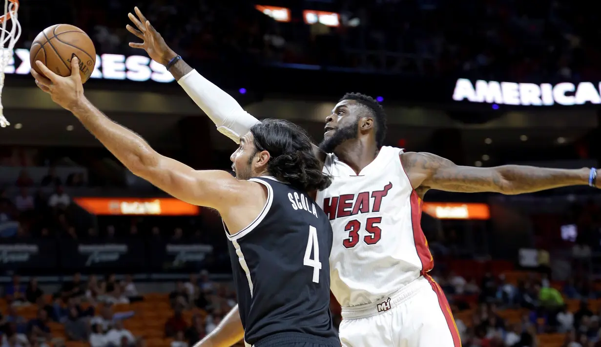 Miami Heat meraih kemenangan pada laga kandang pertama pramusim NBA 2016-17. Heat mengalahkan Brooklyn Nets 121-100 di American Airlines Arena (AAA), Miami, Florida, AS, Rabu (12/10/2016) pagi WIB. ( (AP Photo/Alan Diaz)