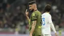 <p>Tapi, gol itu akhirnya dianulir wasit karena striker asal Prancis itu mencetak gol dengan tangan bukan dengan kepalanya. (AP Photo/Luca Bruno)</p>