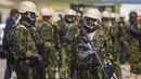 Kedatangan polisi Kenya itu merupakan intervensi militer asing besar-besaran keempat di Haiti. (AP Photo/Marckinson Pierre)