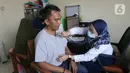 Vaksinasi meningitis untuk meningkatkan kekebalan tubuh dari serangan penyakit meningitis saat pelaksanaan ibadah Haji. (Liputan6.com/Herman Zakharia)