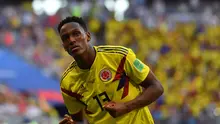 Bek Kolombia Yerry Mina merayakan gol ke gawang Jepang pada laga Grup H Piala Dunia  2018 di Cosmos Arena, Kamis (28/6/2018). (AFP/Manan Vatsyayana)