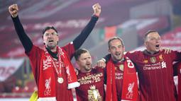 Juru taktik asal Jerman itu berhasil mengakhiri puasa gelar liga Liverpool yang telah berlangsung selama 30 tahun. (Laurence Griffiths, Pool via AP)