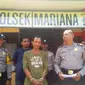 SU ditangkap Unit Reskrim Polsek Mariana usai buron satu tahun setelah menganiaya istrinya (Liputan6.com / Nefri Inge)