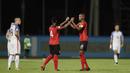 Pemain Trinidad Tobago merayakan kemenangan atas Amerika Serikat pada laga kualifikasi Piala Dunia di Stadion Ato Boldon, Selasa (10/10/2017). Trinidad dan Tobago menang 2-1 atas  Amerika Serikat. (AP/Rebecca Blackwell)