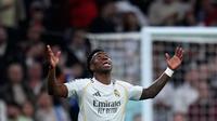 Vinicius Jr menjadi pahlawan kemenangan Real Madrid atas Benfica dalam laga leg 2 play off Liga Champions 2025/2026 di Santiago Bernabeu, Madrid, Spanyol, Rabu (25/02/2026) waktu setempat. (AP Photo/Manu Fernandez)