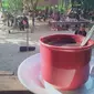 Kopi tebu, minuman kopi yang diolah tradisional dengan sari pati air tebu yang disajikan di kedai Menapo, Desa Muara Jambi, Kabupaten Muaro Jambi. (Liputan6.com / Gresi Plasmanto)