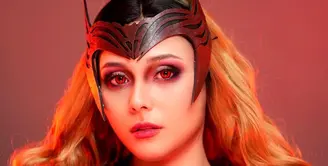 Greta Iren dikenal masyarakat sebagai kakak dari influencer Laura Anna. Memiliki fitur wajah yang mirip dengan Elizabeth Olsen, Greta Iren pun didandani menjadi Wanda Scarlet Witch di film Doctor Strange 2. (instagram/clarissaputri_)