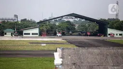 Sejumlah pesawat parkir di Apron Bandara Pondok Cabe, Pamulang, Tangerang Selatan, Banten, Rabu (29/12/2021). Kementerian Perhubungan menunjuk Bandara Pondok Cabe dan Bandara Soekarno-Hatta sebagai bandara pengganti selama revitalisasi Bandara Halim Perdanakusuma. (Liputan6.com/Faizal Fanani)