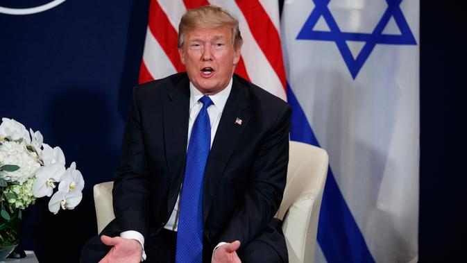 Presiden AS Donald Trump di sela Forum Ekonomi Dunia, Davos (25/1). Dalam pertemuannya Trump mengatakan Palestina sudah 'tidak menghormati' terkait keputusan kontroversialnya mengakui Yerusalem sebagai ibu kota Israel. (AP Photo / Evan Vucci)