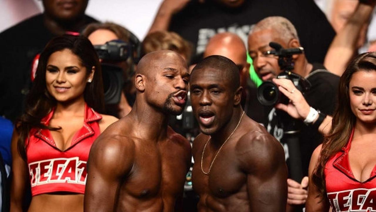 Jelang pertarungan, Mayweather dan Berto saling tatap