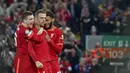 Pemain Liverpool Jordan Henderson (tengah) melakukan selebrasi usai mencetak gol ke gawang AC Milan pada pertandingan Grup B Liga Champions di Anfield, Liverpool, Inggris, Rabu (15/9/2021). Liverpool menang 3-2. (AP Photo/Rui Vieira)