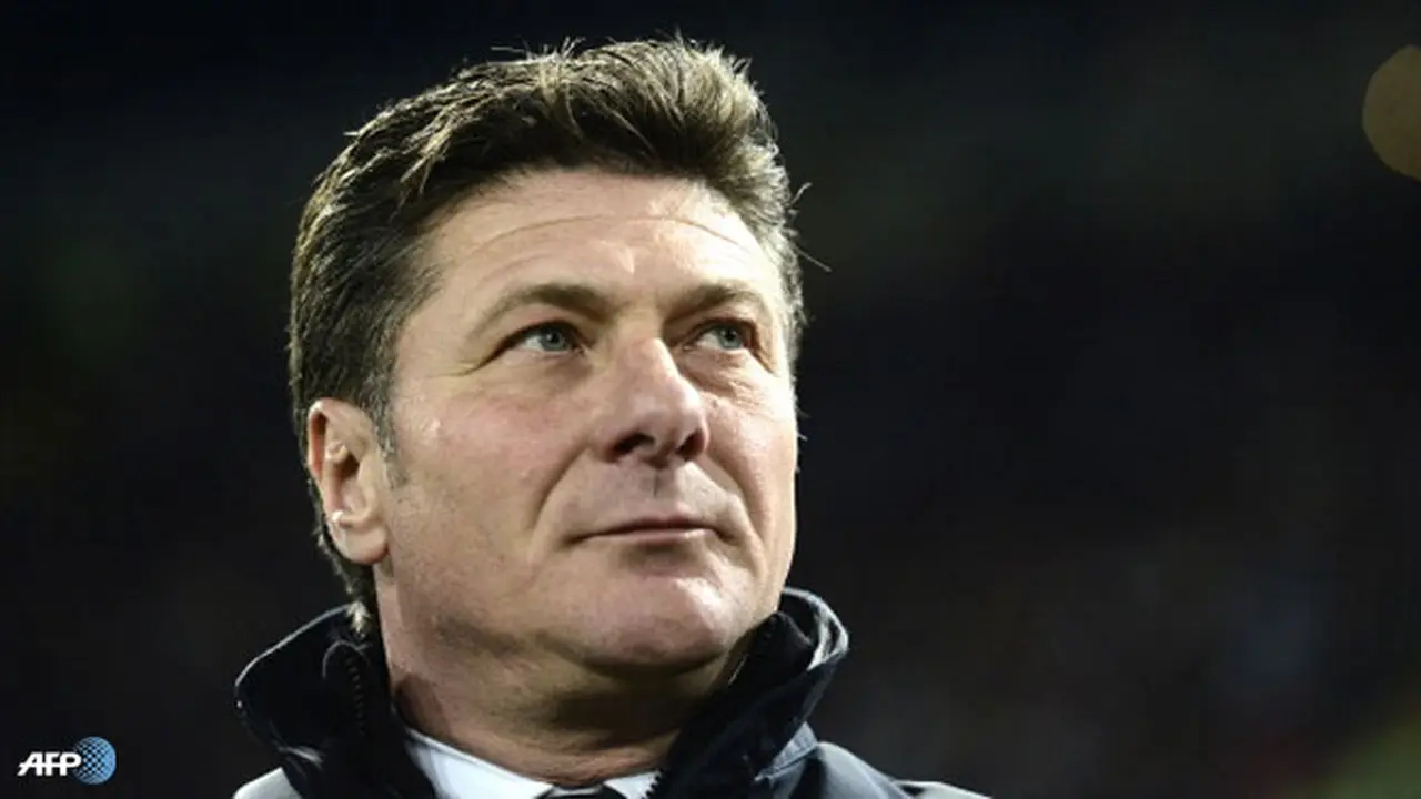 walter-mazzarri-130415-logo.jpg