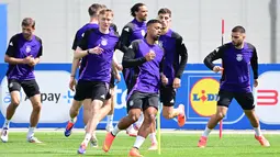 Tim nasional Jerman akan memainkan laga kedua fase grup Euro 2024 melawan Hongaria di MHPArena (Stuttgart Arena) pada Rabu, 19 Juni 2024 malam WIB. (Tobias SCHWARZ / AFP)