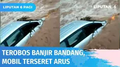 Berhati-hatilah saat berkendara di tengah bencana. Gegara nekat terobos banjir bandang di Tuban, sebuah mobil terseret arus. Beruntung sang sopir sempat menyelamatkan diri dan tidak ikut terbawa arus.