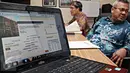 Sebuah layar monitor menunjukkan salah satu data Daftar Pemilih Tetap (DPT) sementara dalam penyelenggaraan Pemilukada 2015 di Kantor KPU, Jakarta, Selasa (13/10). (Liputan6.com/Immanuel Antonius)