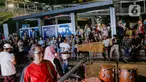 Grup musik OP Voice Band tampil dalam acara bertajuk Musik Tepi Barat dan Timur di jalur pedestrian kawasan Sudirman, Jakarta, Jumat (22/11/2019). Kegiatan rutin itu diadakan Dinas Pariwisata dan Kebudayaan Provinsi DKI pada Selasa dan Jumat mulai pukul 16.30 - 19.30 WIB (Liputan6.com/Faizal Fanani)