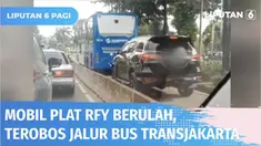 Kendaraan berplat khusus, RFY, terekam kamera warga menerobos jalur bus Transjakarta di kawasan Margasatwa, Pasar Minggu. Menurut polisi, pengendara beralasan ingin cepat untuk antar kerabatnya ke rumah sakit.