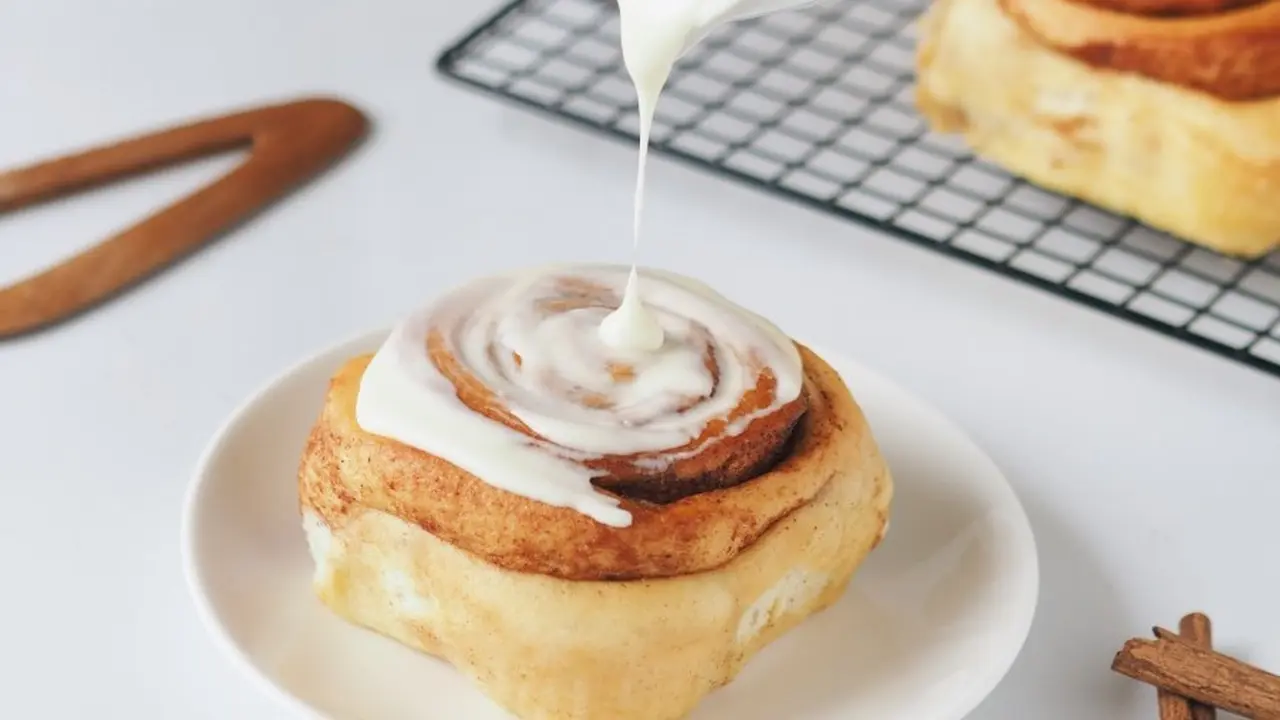 Cinnamon Rolls With Cream Cheese Topping.