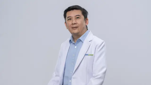 Prof. Dr. dr. Julius July, Sp.BS (K) Onk, MKes, IFAANS