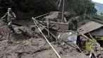 Seorang tentara berjalan melewati rumah-rumah yang rusak akibat tanah longsor yang dipicu gempa bumi di Bangli, di Bali, Sabtu (16/10/2021). Beberapa orang tewas dan lainnya luka-luka saat gempa berkekuatan sedang dan gempa susulan menghantam pulau itu Sabtu dini hari. (AP Photo/Dewa Raka)