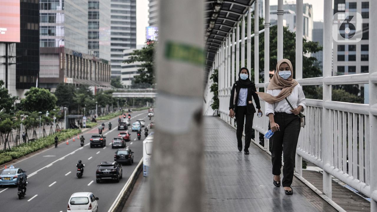 FOTO: Pembatasan 25 Persen Pekerja Kantoran