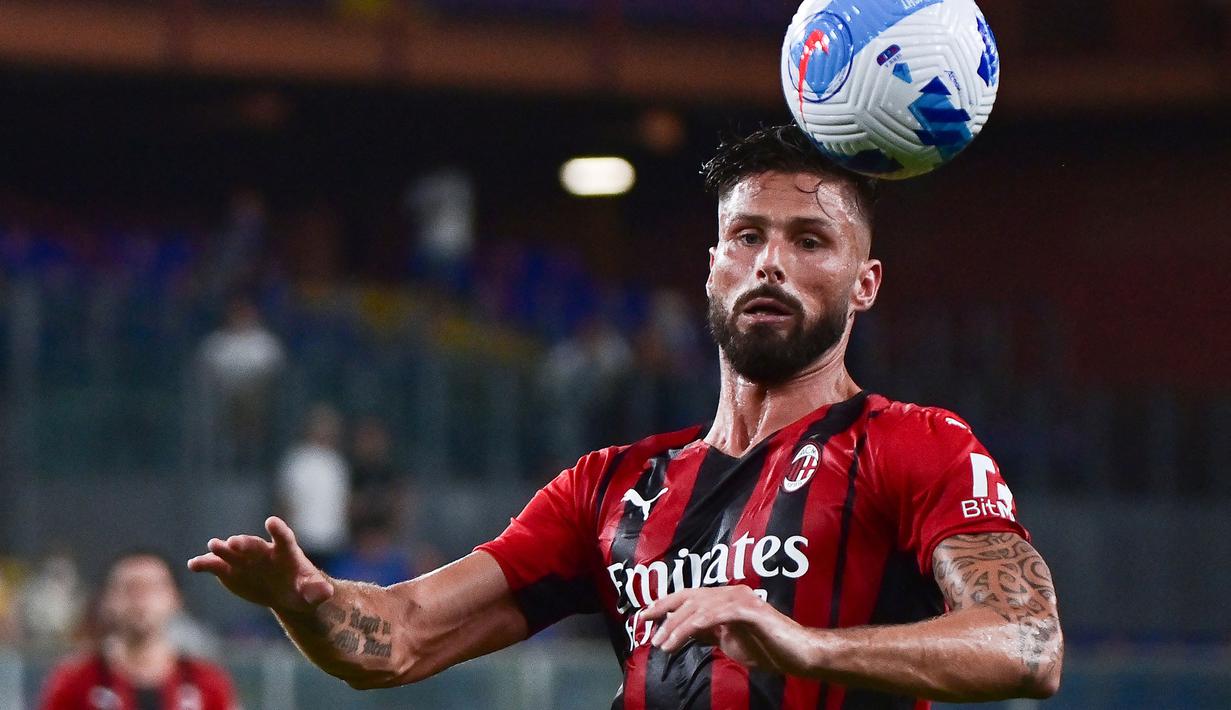 Rekrutan anyar AC Milan, Olivier Giroud juga berhasil tampil impresif pada laga debutnya di Rossoneri. Pelatih Stefano Pioli langsung mempercayakan Giroud sebagai starter di laga tersebut. (Foto: AFP/Miguel Medina)