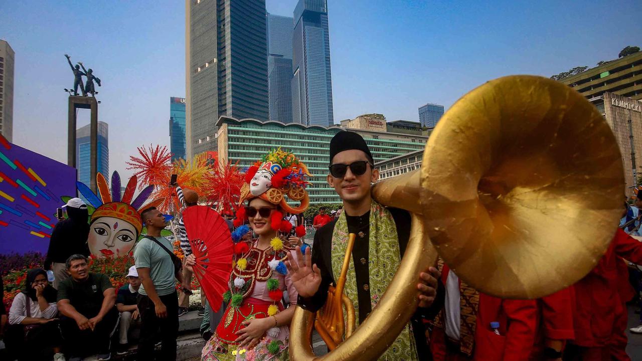 FOTO: Pawai Budaya Betawi Semarakkan HUT ke 499 Jakarta di Bundaran HI