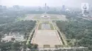 Pemadangan saat polusi menyelimuti langit Monumen Nasional (Monas) dan gedung bertingkat di Jakarta, Senin (20/6/2022). Sementara konsentrasi PM 2.5 di udara saat ini 27 kali di atas nilai panduan kualitas udara tahunan WHO yang menunjukkan bahwa kualitas udara di Ibu Kota termasuk kategori tidak sehat. (merdeka.com/Iqbal S. Nugroho)