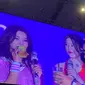 Jeon So-Yeon mencoba makan kue ape di (G)I-DLE Fan Convert ICE BSD, Minggu (09/06/2024). (dok. Liputan6.com/Rusmia Nely)