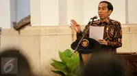 Presiden Joko Widodo (Jokowi) memberikan sambutan saat Peringatan Hari HAM se-dunia 2015 di Istana Negara, Jakarta, Jumat (11/12). (Liputan6.com/Faizal Fanani)