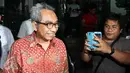 Sekjen Kementerian PUPR, Taufik Widjoyono memenuhi panggilan KPK, Jakarta, Kamis (31/3). Taufik menjadi saksi atas kasus dugaan suap proyek pembangunan jalan di Kementerian PUPR. (Liputan6.com/Helmi Afandi)