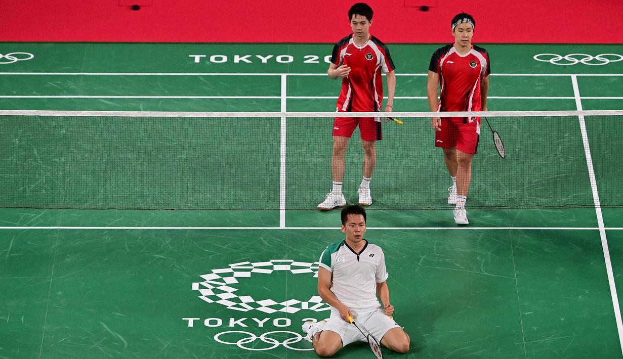 Dengan hasil ini, pasangan Indonesia harus turun diperingkat kedua dan keluar menjadi runner up klasemen sementara grup A Olimpiade Tokyo 2020. (Foto: AFP/Pedro Pardo)
