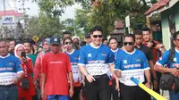 Kapolda Kalimantan Utara Irjen Pol Daniel Adityajaya ikuti kegiatan Jalan Sehat bersama para buruh, Senin (1/5/2023).