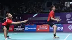 Ganda putra Indonesia, Fajar Alfian/M Rian Ardiantosaat melawan pemain India, Manu Attri/Sumeeth Reddy Buss pada perempat final Bulutangkis Beregu Putra Asian Games 2018 di Jakarta, Senin (20/8). (Liputan6.com/Helmi Fithriansyah)