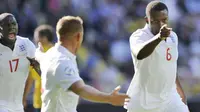 Selebrasi bek Inggris U-21, Nedum Onuoha (kanan) seusai mencetak gol ke gawang Swedia di babak semifinal Piala Euro U-21 yang berlangsung di Ullevi Arena, Gotenborg, 26 Juni 2009. AFP PHOTO / Bjorn Larsson Rosvall