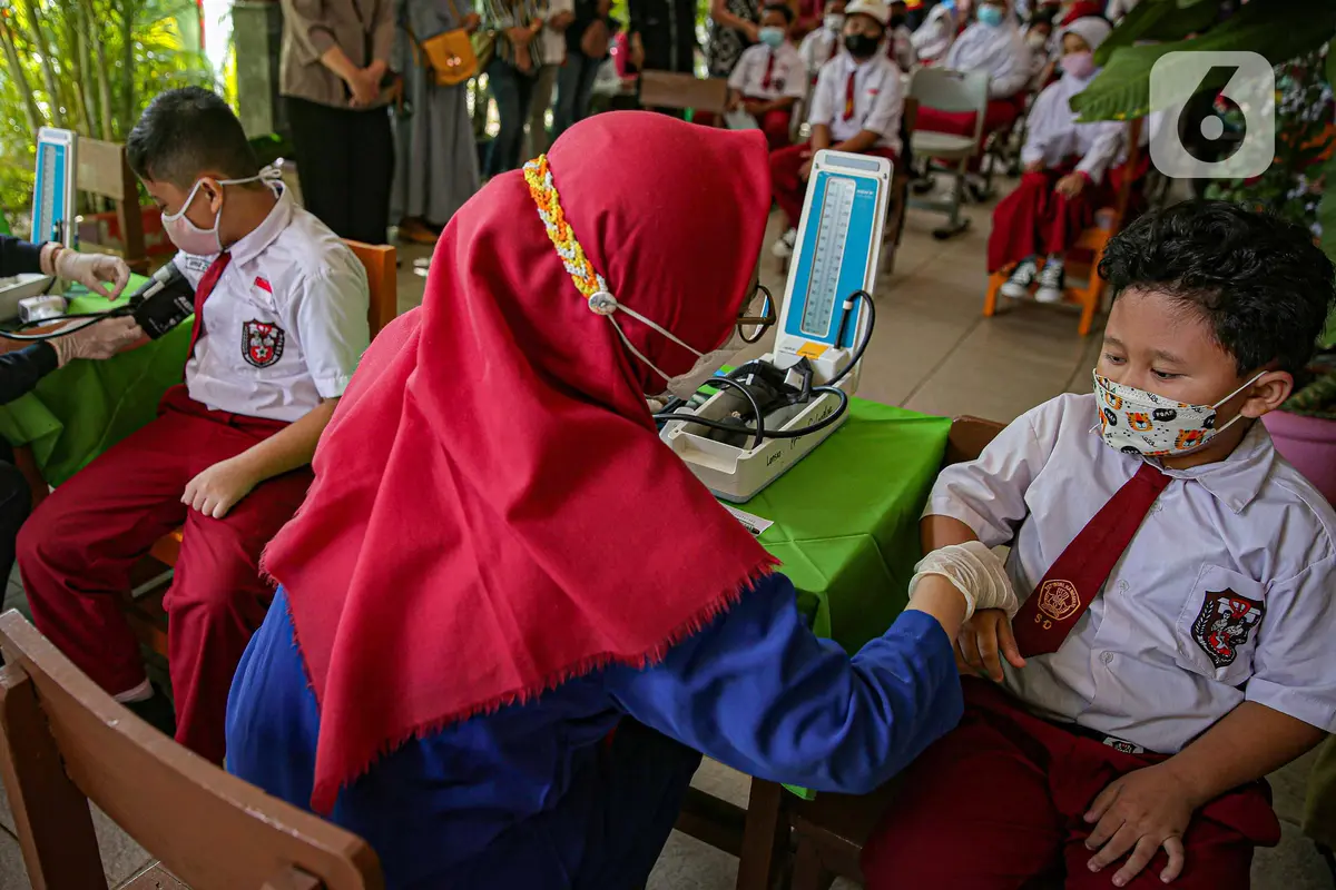 FOTO: Pelaksanaan Vaksinasi COVID-19 untuk Anak Usia 6-11 Tahun