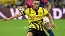 Borussia Dortmund terus mengejar gol berikutnya. Namun, di menit-menit akhir pertandingan Barcelona berhasil mengontrol ritme permainan dengan baik. Laga berakhir dengan skor akhir 3-1 untuk kemenangan Borussia Dortmund. (INA FASSBENDER/AFP)
