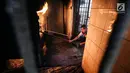 Tukidjo sedang proses kremasi anjing peliharaan di Pondok Pengayom Satwa Jakarta, Senin (8/4). Ada tarif tambahan apabila berat hewan peliharaan yang akan dikremasi lebih dari 5 kilogram. (Liputan6.com/Fery Pradolo)