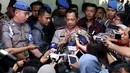 Kapolri Jenderal Tito Karnavian memberikan keterangan pers usai menggelar Rapat Kerja dengan Komisi III DPR RI, di Kompleks Parlemen, Senayan, Jakarta, Senin (17/7). (Liputan6.com/Johan Tallo)