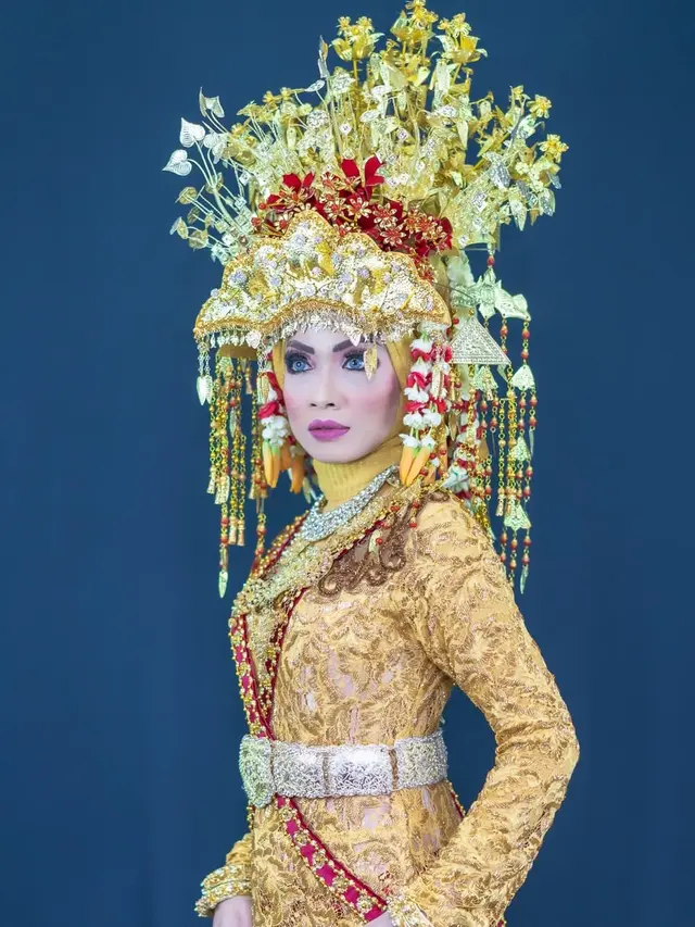 Ilustrasi Pak Sangkong, pakaian adat Sumatera Selatan