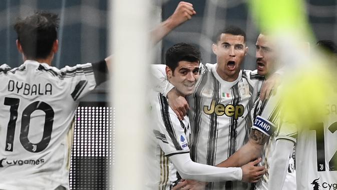 Juventus meraih kemenangan 3-1 atas Genoa pada laga pekan ke-11 Serie A di Stadio Luigi Ferraris, Senin (14/12/2020) dini hari WIB. (AFP/Marco Bertorello)