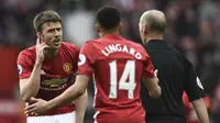 Gelandang senior Manchester United (MU), Michael Carrick. (Oli SCARFF / AFP)