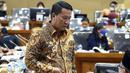Ketua Baleg DPR RI Supratman Andi Agtas menghadiri Rapat Kerja dengan pemerintah di Kompleks Parlemen, Jakarta, Kamis (22/7/2020). Baleg menggelar rapat Panitia Kerja (Panja) RUU Cipta Kerja dengan agenda melanjutkan pembahasan Daftar Inventarisasi Masalah (DIM) Bab III. (Liputan6.com/Johan Tallo)