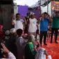 Warga mengikuti kegiatan kick-off “Ramadan Berbagi” yang digelar FRESTEA dan Coca-Cola di Collection Center Yayasan Mahija Parahita Nusantara Tebet, Jakarta (Liputan6.com/HO)