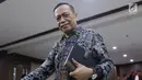 Mantan anggota Komisi XI DPR RI dari Fraksi Partai Demokrat, Amin Santono usai menjalani sidang perdana di Pengadilan Tipikor, Jakarta, Kamis (20/9). Sidang beragendakan pembacaan dakwaan dari JPU KPK. (Liputan6.com/Helmi Fithriansyah)