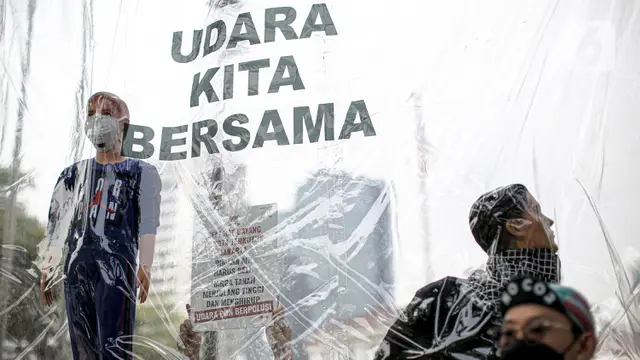Aksi Simbolik Aktivis Lingkungan Menuntut Udara Bersih