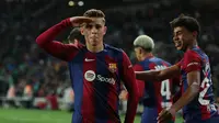 Empat gol Barca kali ini datang dari Fermin Lopez (22') dan hattrick Robert Lewandowski (49', 82', 90+3'). (LLUIS GENE / AFP)