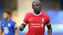 Sadio Mane tampil impresif dengan membawa Liverpool ke peringkat ketiga Liga Inggris musim ini. Bersama Senegal, ia telah mengoleksi 25 gol dan 18 assist dalam 78 penampilannya di semua ajang. Mane tentu akan menjadi tulang punggung negaranya di Piala Afrika 2021 ini. (AFP/Michael Regan)