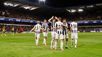 Selebrasi&nbsp;skuad Newcastle dalam laga versus Union Saint-Gilloise di Liga Champions, Rabu (1/10/2025). (AP Photo/Geert Vanden Wijngaert)