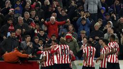 The Reds harus menelan pil pahit setelah ditundukkan tuan rumah dengan skor 1-3. (AP Photo/Ian Walton)